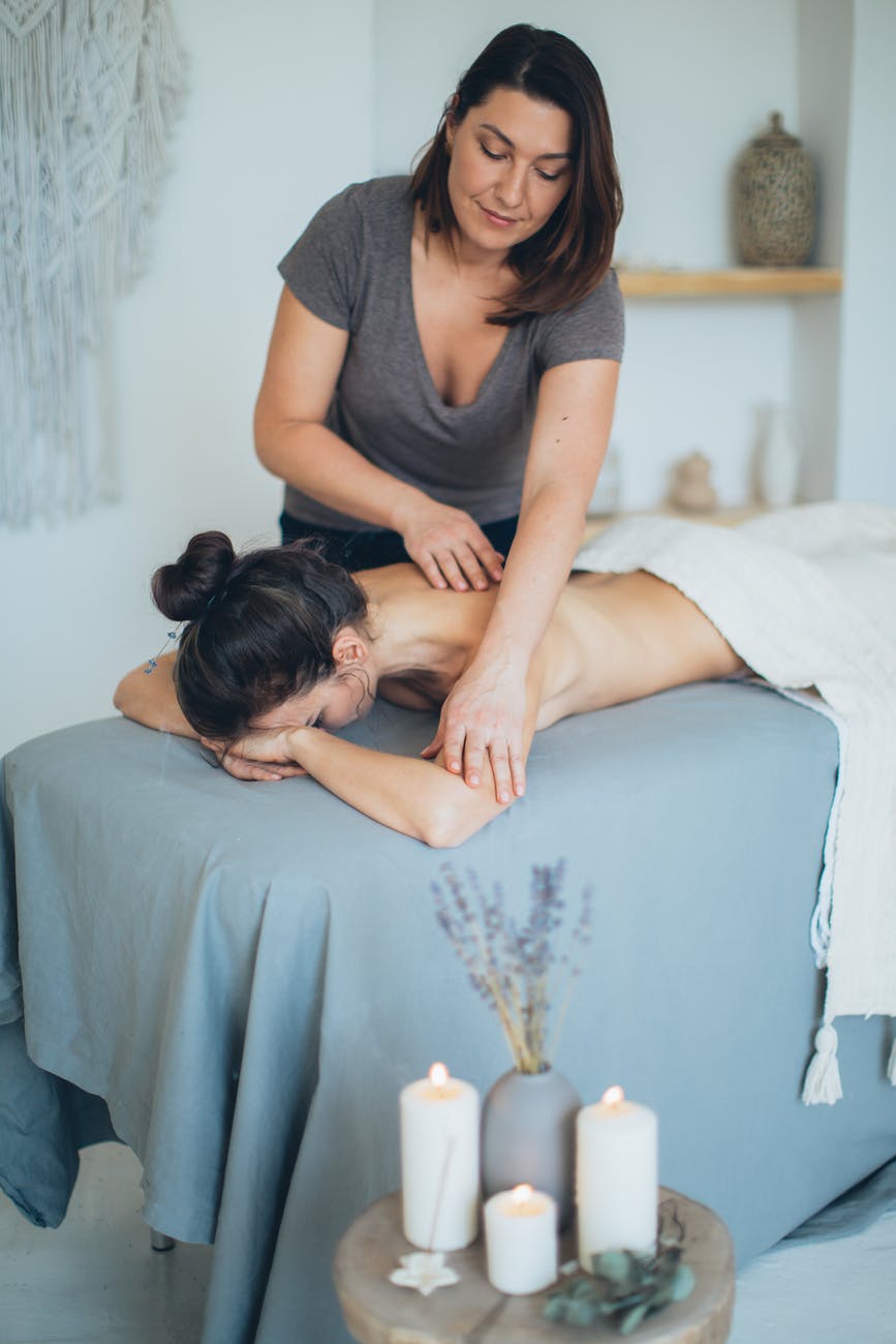 Young woman during massage in beauty saloon